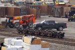 Trucks awaing loading into containers